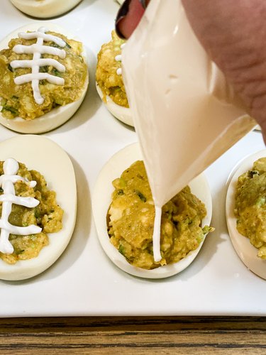 How to Make Guacamole Deviled Egg Footballs