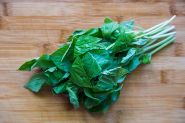 Fresh basil on a cutting board