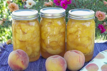 Even though fresh peaches are only available for a few months in the summer, there's no reason you can't enjoy them all year long. Just choose some fresh ripe peaches, grab a few jars, a little sugar, and you'll be on your way to preserving these delightful beauties in no time.