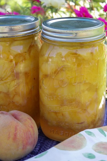 Even though fresh peaches are only available for a few months in the summer, there's no reason you can't enjoy them all year long. Just choose some fresh ripe peaches, grab a few jars, a little sugar, and you'll be on your way to preserving these delightful beauties in no time.