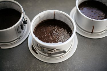 Divide the batter between the cake tins set aside above.