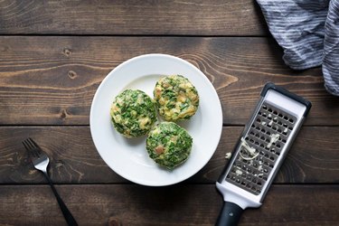 Cheesy Baked Eggs in a Muffin Tin | eHow