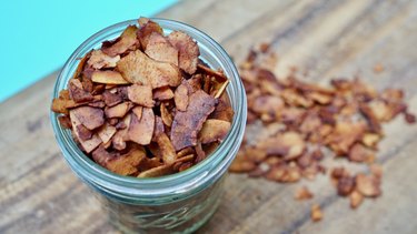 Storing coconut bacon in mason jar.