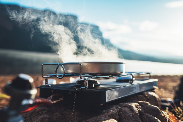 60 Easy Vegan Camping Meals | If you're looking for simple, family-friendly, plant-based camping meals, this post is for you! We've curated the best healthy vegan camping recipes for breakfast, lunch, and dinner, with tons of make make ahead recipe ideas as well as one pot meals and foil packets you can cook over your campfire (or in your dutch oven). Whether you prefer to plan and prep ahead, or need quick meals you can make on the fly, this post is full of delish ideas!